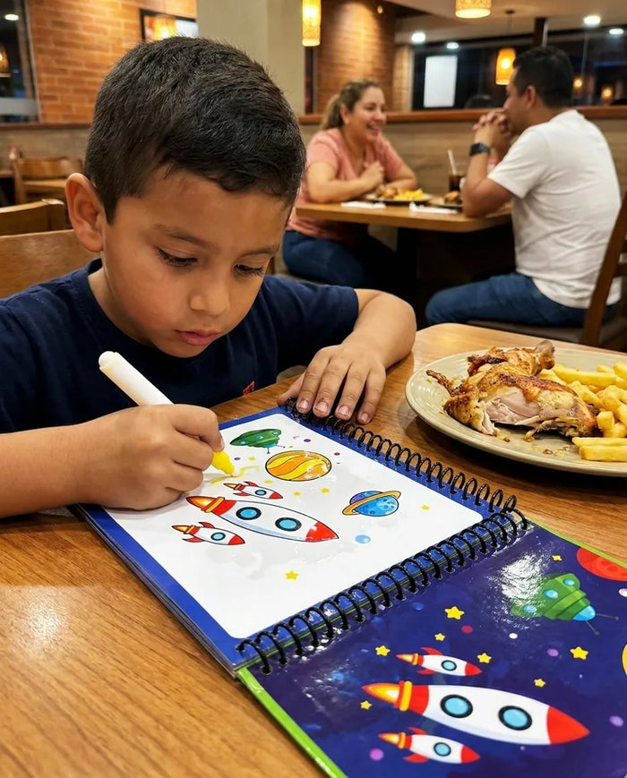 Child coloring with a Magic Water Coloring Book at a restaurant